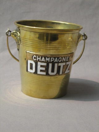 A French brass ice pail with swing handle and enamelled decoration marked Champagne Deutz