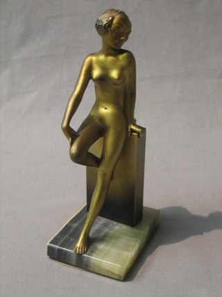 Lorenzle, an Art Deco Austrian gilt spelter table lighter in the form of a standing naked lady, base marked Lorenzle Austria, 9"