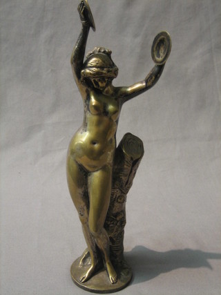 Manin, a gilt bronze figure of a standing classical naked lady with symbols resting upon a tree 11"