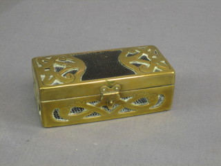 An  Art Nouveau pierced brass and leather razor box with hinged lid 5"