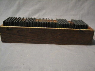 A set of 9 wooden dominoes
