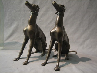 A pair of Art Deco style "bronze" figures of seated dogs 14"