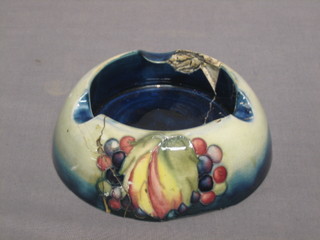 A circular Moorcroft ashtray, the base with signature mark and impressed Made in England 5" (heavily f and r)