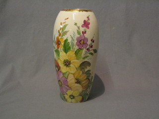 A Moorcroft vase hand painted by Mrs Pickford, with floral decoration and gilt banding against a white background, the base impressed Moorcroft Made in England and marked Mrs Pickford hand painted 12"