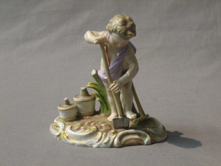 A "Meissen" figure of a porcelain cherub gardener, the base with cross swords mark and impressed C100 (f) 6"