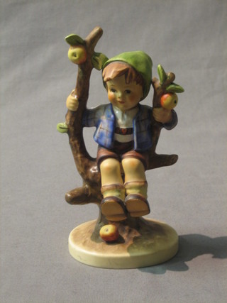 A Goebal figure of a boy in an apple bower 6", base marked Goebal 142/1 (f and r)