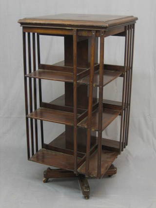 A Victorian square mahogany revolving bookcase 32"