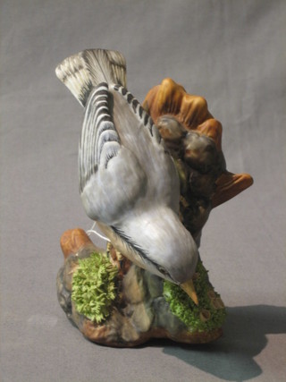 A Royal Staffordshire figure of a Nuthatch no. 276 modelled by J Bromley (slight hair crack to base) 5"