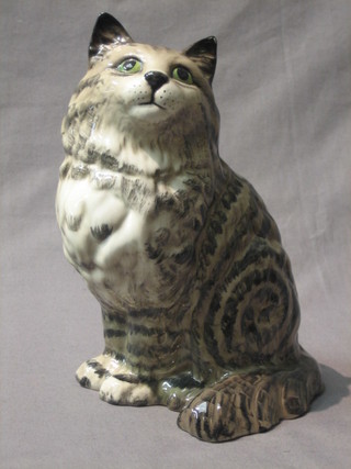 A Beswick  figure of a seated tabby cat, the base impressed 1867, ear restored, 9"