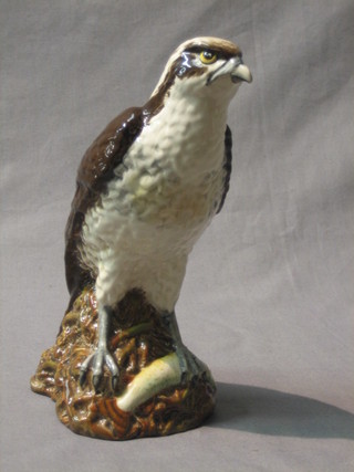 A Doulton flask in the form of an Osprey manufactured for Whyte & Mackay 1977, complete with contents