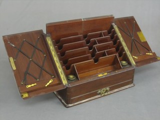 A 19th Century walnut sloped stationery box with fitted interior, the base fitted a drawer 15"