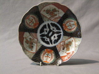 A fine quality circular Japanese Imari porcelain plate with panelled decoration 9"