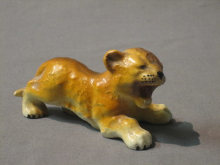 A Goebal figure of a roaring lion cub 4", the base marked GW4010