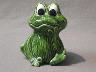 A Sylvac figure of a seated frog, the base marked 5097 6"