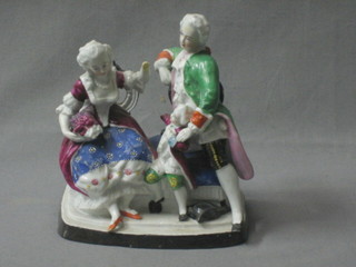 A 19th Century biscuit porcelain figure group of a seated family 6" (f)