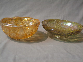 A circular orange Carnival glass bowl with wavy border 8" and 1 other 9"