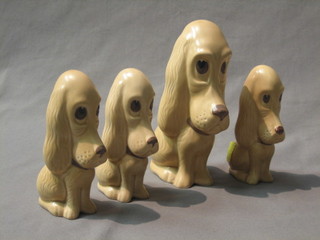 A set of 4 graduated Sylvac brown glazed figures of seated dogs