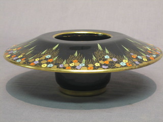 A circular black glazed Carltonware posy bowl with floral decoration 9" (f and r)
