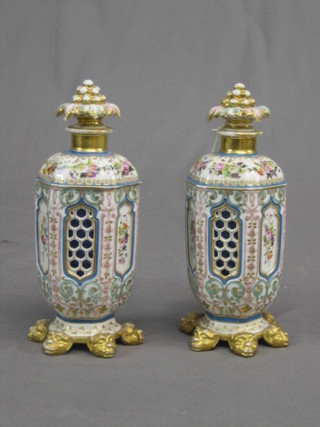 A pair of 19th Century German porcelain vases with panelled and pierced decoration 9" (heavily f)