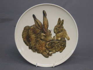 A circular Goebal's 1975 1st edition mug and series plate decorated rabbits 7"