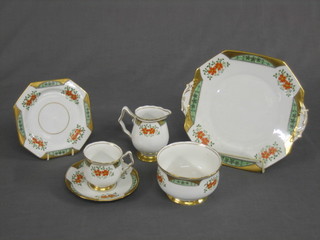 A Royal Staffordshire 21 piece Art Deco tea service comprising twin handled bread plate 10", 6 octagonal tea plates 6 1/2", cream jug, sugar bowl, 6 cups and 6 saucers