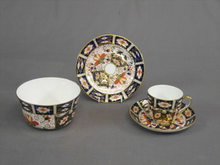 A 34 piece Royal Crown Derby tea service comprising 5" circular bowl, 2 circular plates 9", 12 tea plates 6", 10 saucers (2 cracked), 9 cups (2 cracked)