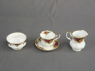 A 22 piece Royal Albert Old Country Rose pattern tea service comprising twin handled bread plate, 6 tea plates 6 1/2", 6 saucers, 8 cups, cream jug and sugar bowl, a part Continental coffee service and an Irish coffee service