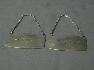 A pair of modern silver decanter labels Port and Sherry 2 ozs