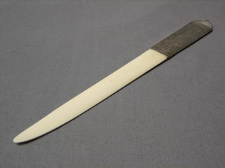 An Eastern  paper knife with ivory blade and silver handle engraved bamboo 10"