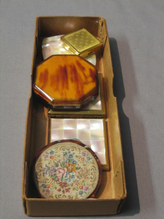 3 gilt metal and mother of pearl effect compacts, 2 tortoiseshell effect compacts and a gilt metal compact