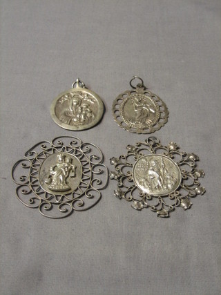 4 Continental "silver" medallions decorated figures of the virgin Mary and Christ