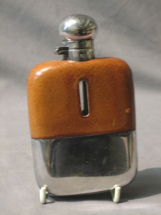 A glass and silver plated hip flask with detachable cup