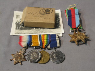 A group of 8 medals awarded to Able Bodied Seaman, later Petty Officer J20054 H F Frost Royal Navy, comprising 1914-15 Star, British War medal, Victory medal, 1939-45 Star, Atlantic Star, Defence and War medal, George V Issue Royal Naval, Long Service, Good Conduct medal named to HMS Pembroke, (together the first LS & GC and 14 trio mounted, the remainder unmounted) together with 2 black and white photographs of the recipient in the HMS Pembroke shooting team