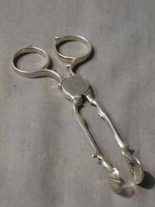 A pair of George III silver sugar nips by  William Chawner 1815