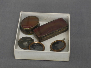 A gilt metal and agate tinder box with hinged lid 2 1/2" and 3 early gilt metal photographic locket brooches