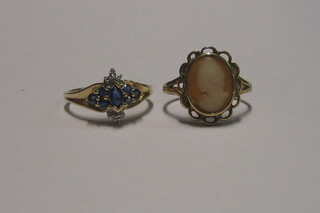 A modern 9ct gold dress ring set blue and white stones and a 9ct gold dress ring set a cameo
