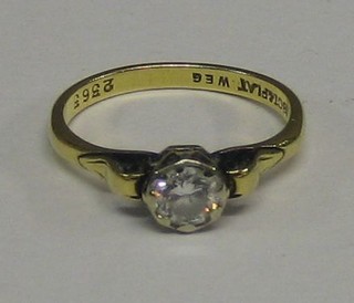 A lady's 18ct gold engagement/dress ring set a solitaire diamond  