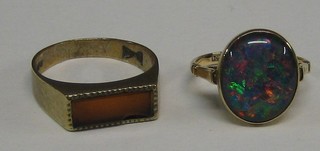 A 9ct gold signet ring set a rectangular cut hardstone and a 9ct gold ring set an opal coloured stone