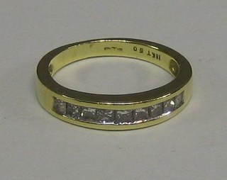 A lady's modern 18ct gold dress ring set 9 diamonds