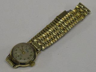 A lady's Veity gold cased wristwatch on a gold plated bracelet