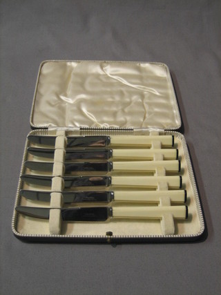 A set of 6 Art Deco tea knives with "ivory" handles