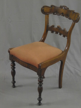 A 19th Century mahogany bar back dining chair with carved mid rail and upholstered drop in seat, raised on turned supports