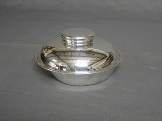 A circular Art Deco silver plated entree dish and cover