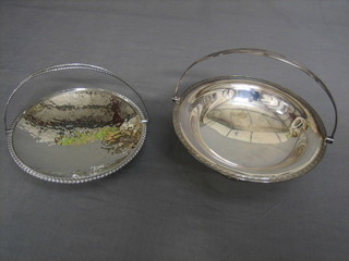A circular silver plated cake basket with swing handle by Mappin & Webb, together with a Spanish silver plated cake basket