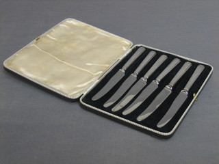 A set of 6 Art Deco silver plated tea knives