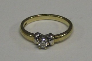 A lady's 15ct gold engagement/dress ring set a diamond