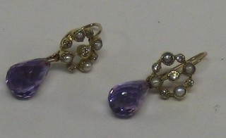 A pair of lady's gold earrings each set 5 diamonds, 4 demi pearls and a tear drop cut amethyst
