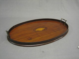 An Edwardian oval inlaid mahogany twin handled tea tray 24"