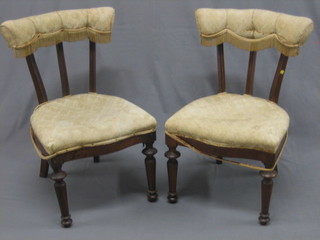A pair of Edwardian walnut stick and bar back bedroom chairs
