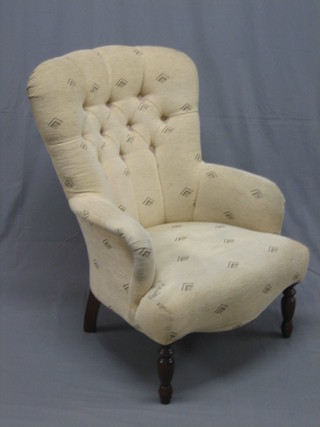 A Victorian style mahogany framed tub back chair upholstered in light coloured buttoned material